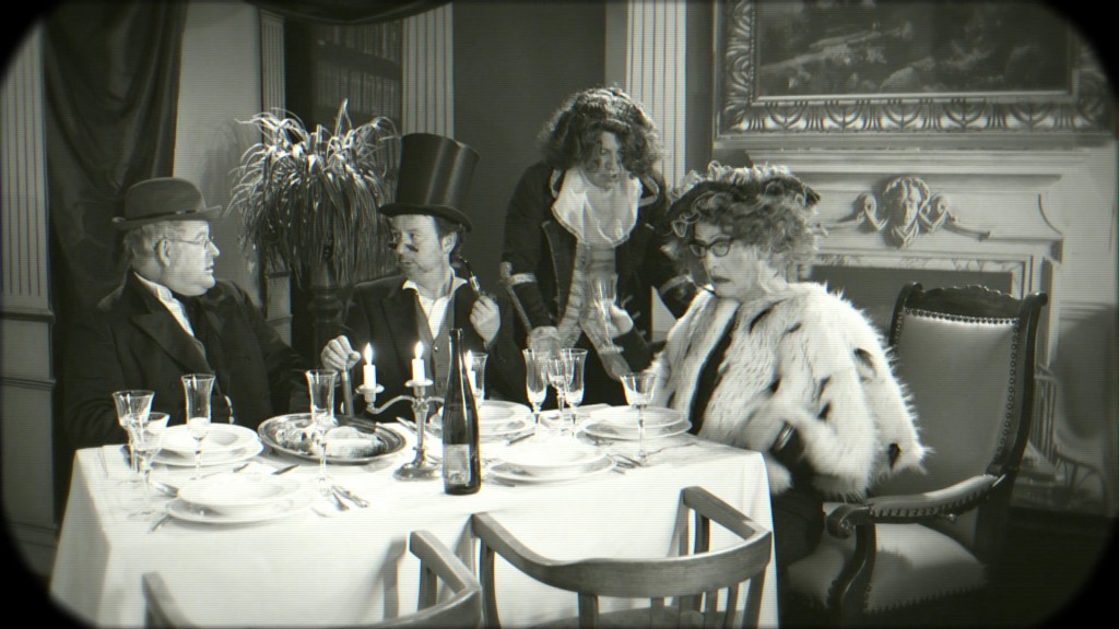 Foto: Schärlock und Gäste am Tisch