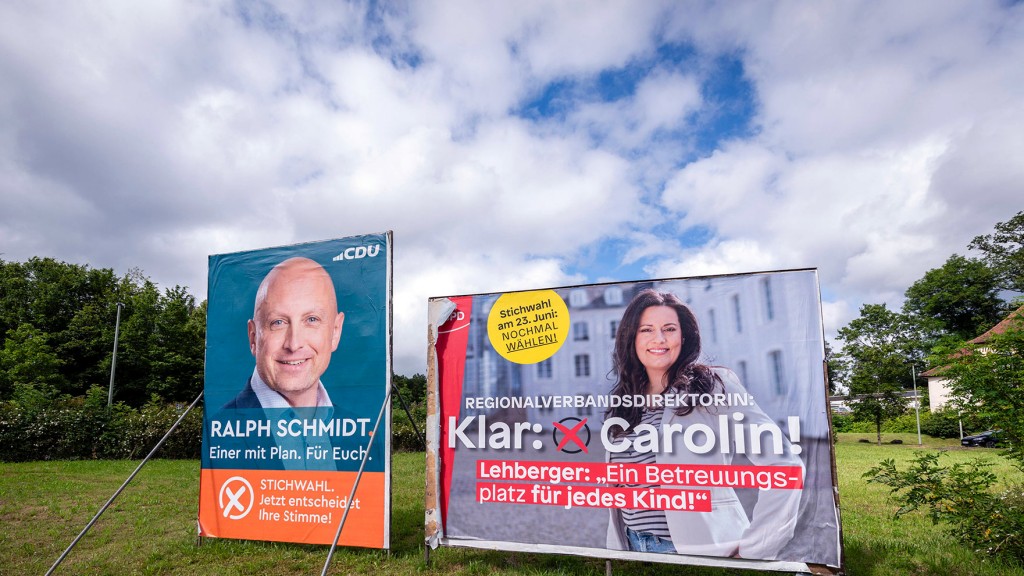 Foto: Wahlplakate der Kandidaten für die Stichwahl zum Regionalverbandspräsidenten in Saarbrücken, Ralph Schmidt (CDU) und Carolin Lehberger (SPD)