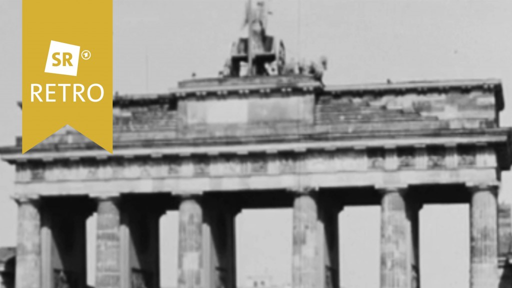 Brandenburger Tor hinter Berliner Mauer