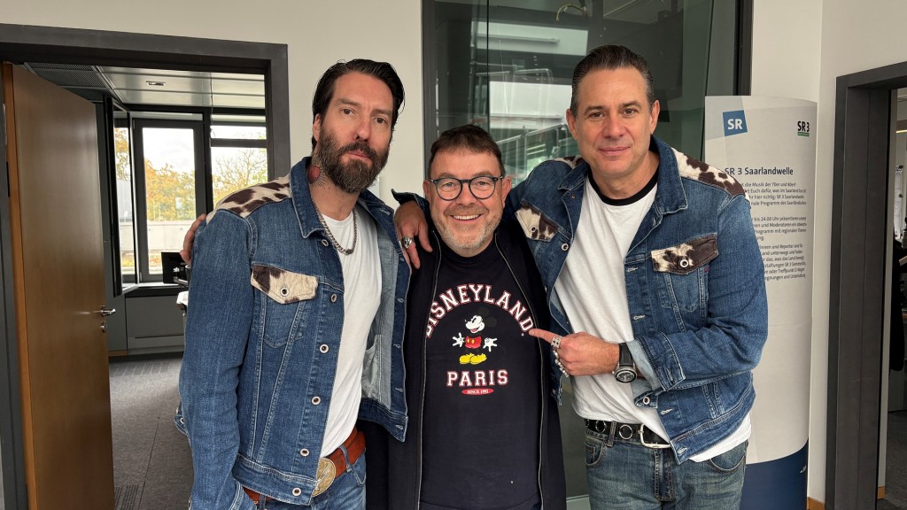Christian Job mit den The BossHoss Frontmännern