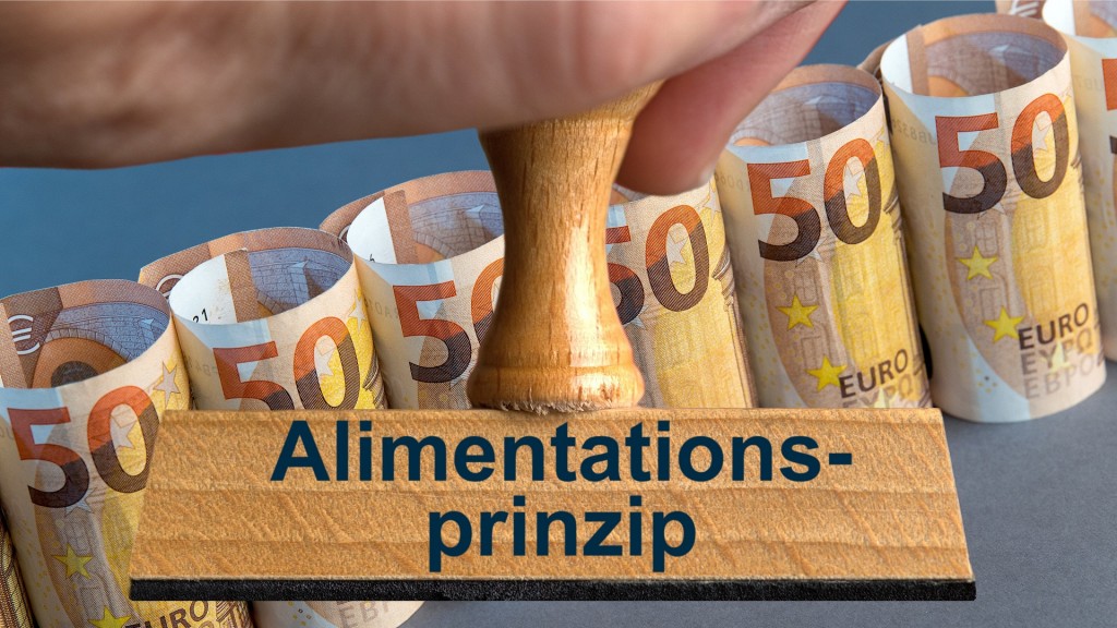 Ein symbolischer Holzstempel mit der Aufschrift 