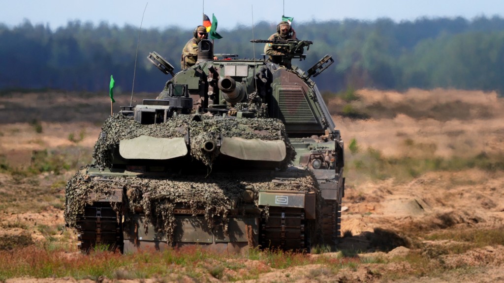 Foto: Soldaten auf einem Panzer