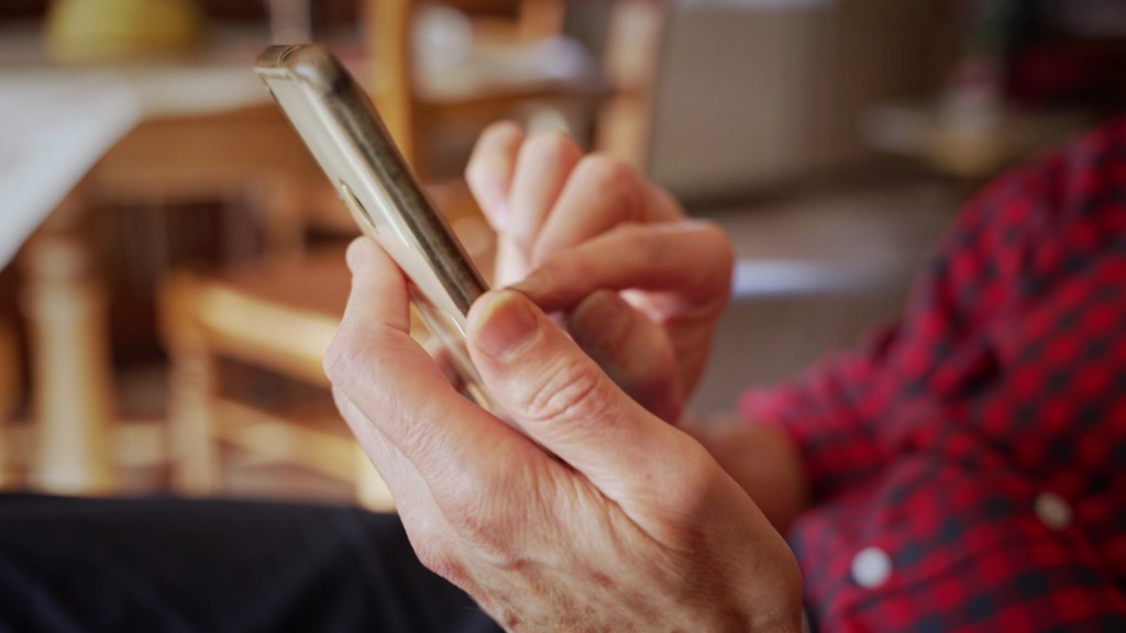 Foto: Handy in einer Hand