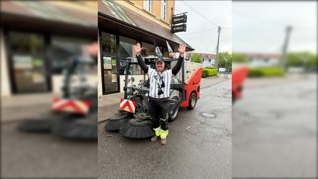 Fan Jörg Fischer mit Kehrmaschine