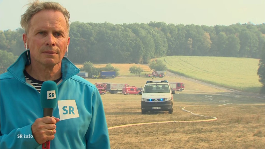 Foto: Jürgen Rinner berichtet vom Waldbrand bei Hüttigweiler