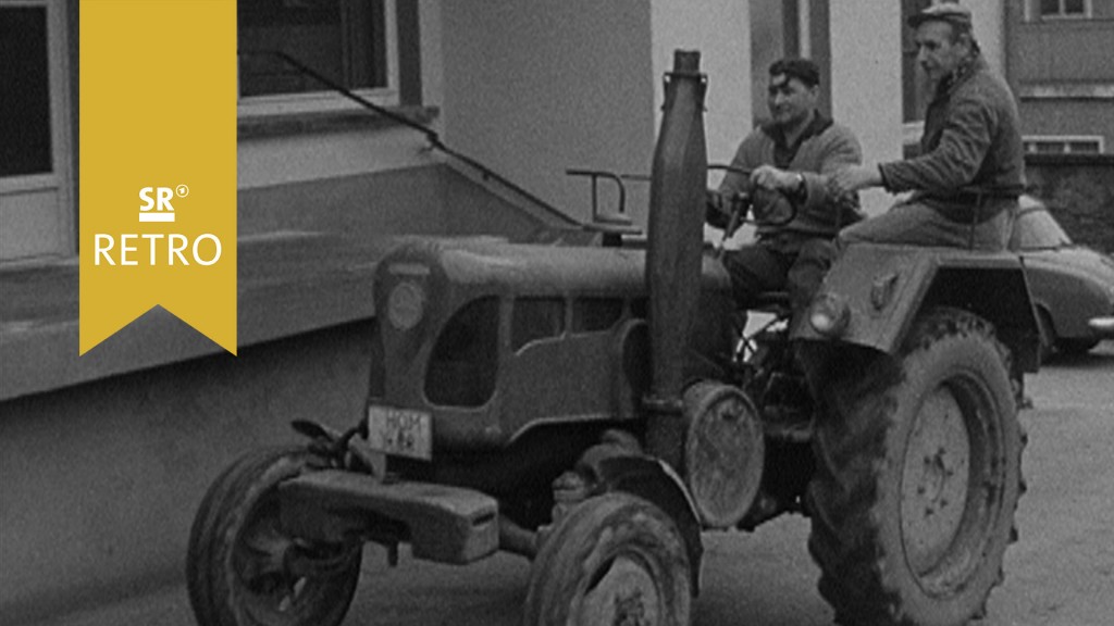Foto: Zwei Männer auf einem Traktor