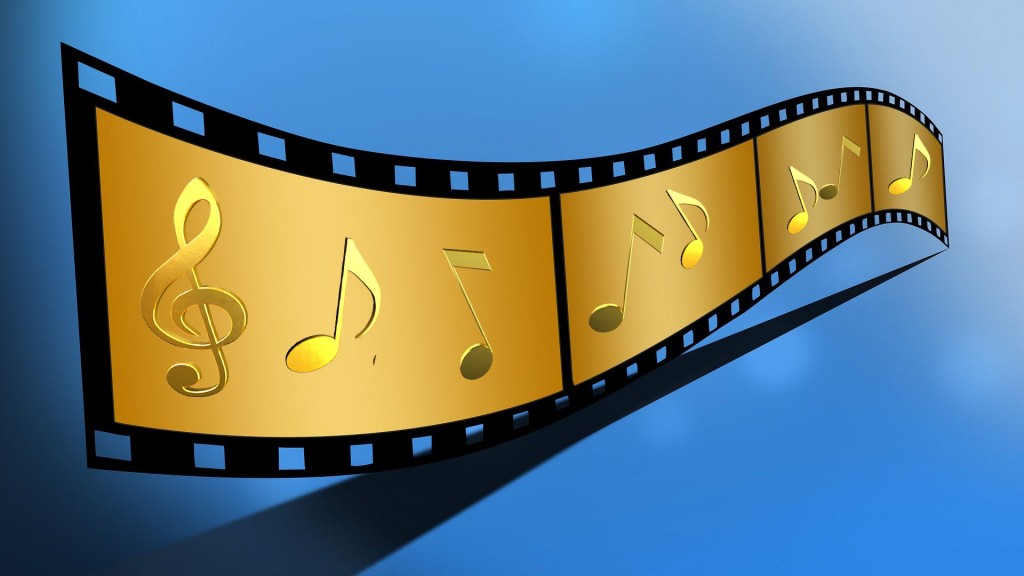 Streifen einer Filmrolle mit Noten auf den einzelnen Bildern. (Bildquelle: Pixabay / Pixabay/JanBaby/kalhh)