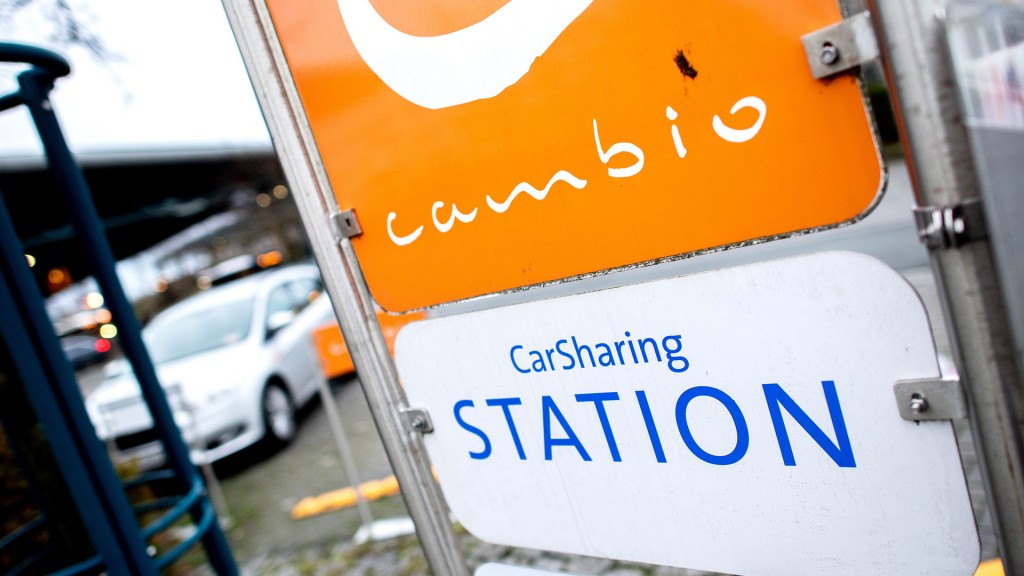 Foto: Ein Schild mit der Aufschrift «CarSharing Station» steht an einem Parkplatz, der für Fahrzeuge des Anbieters Cambio reserviert ist