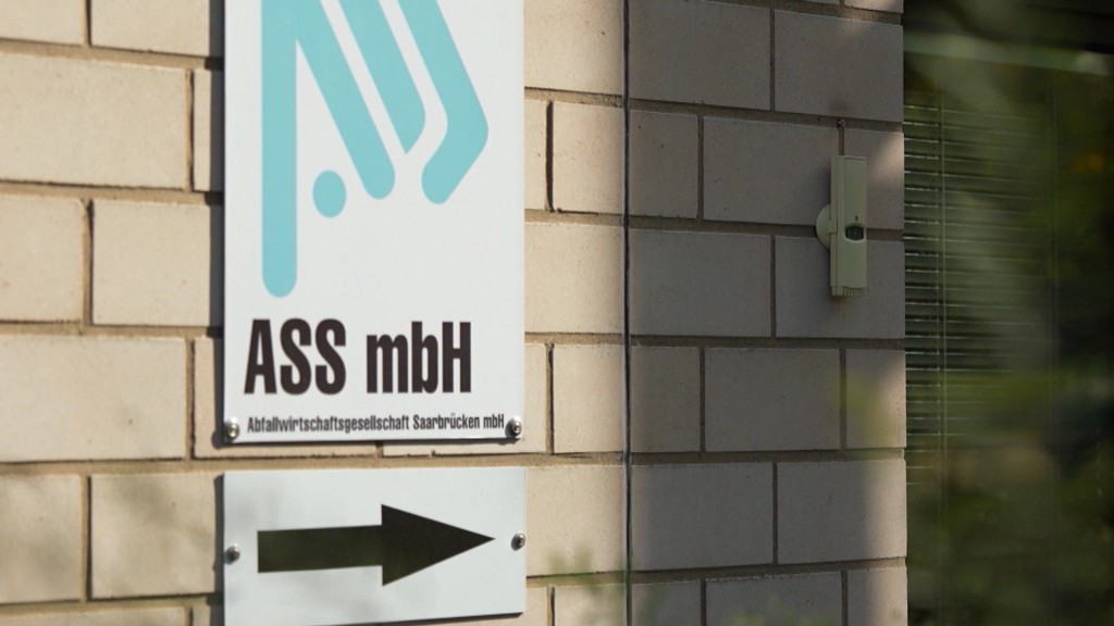 Foto: Schild der ASS an einer Hauswand 